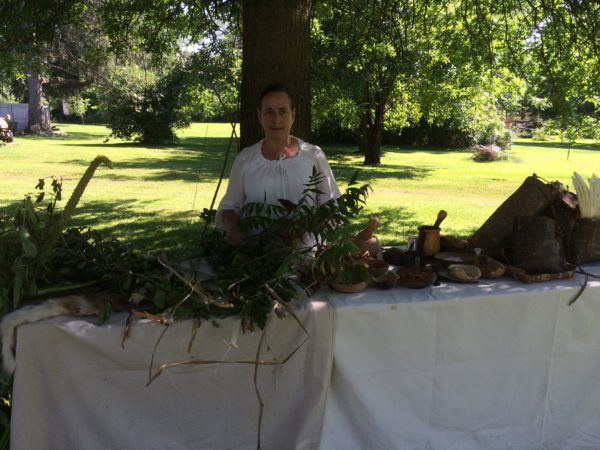 Diane holding some medicinal plants