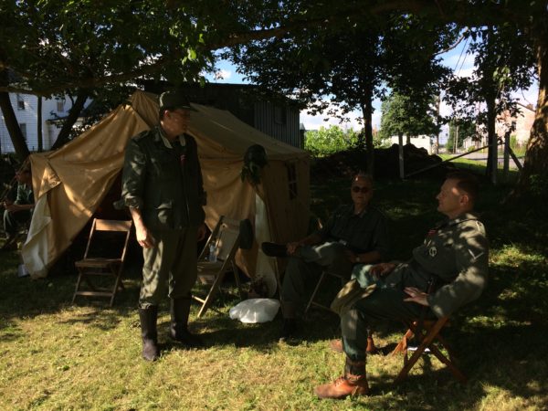 A group of German re-enactors in front of their tent