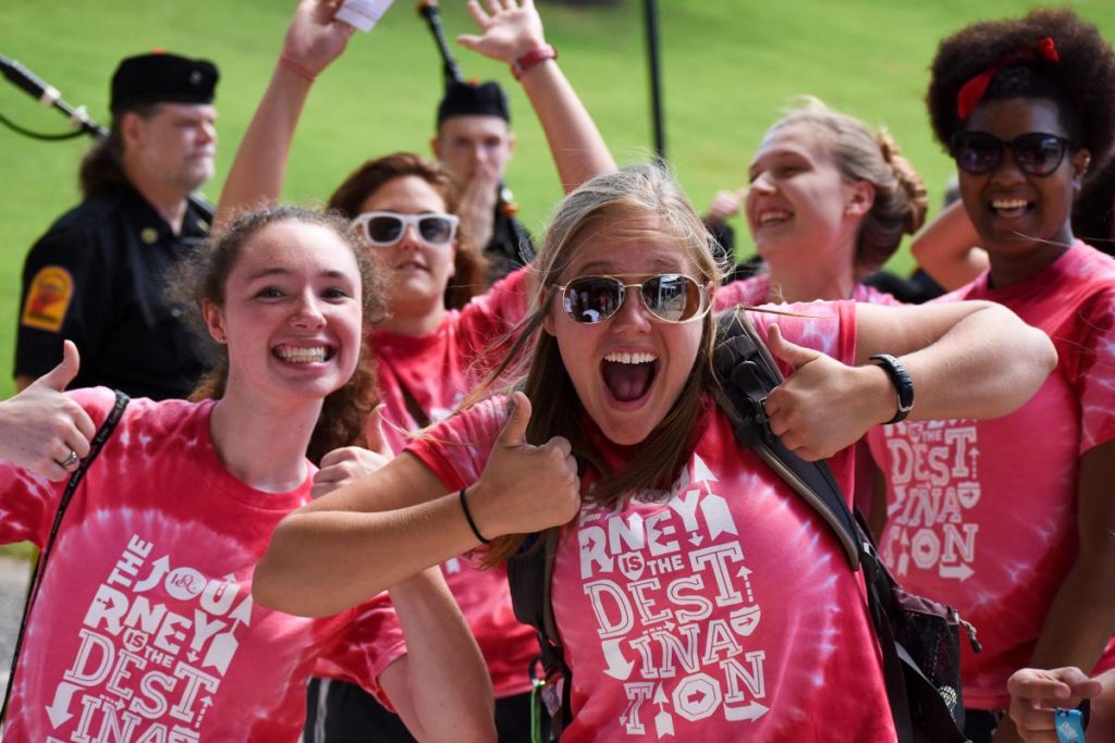 Photo Caption: Resident assistants Sierra Carney, left, and Elise Cardot, right, show their enthusiasm for the start of the new semester.